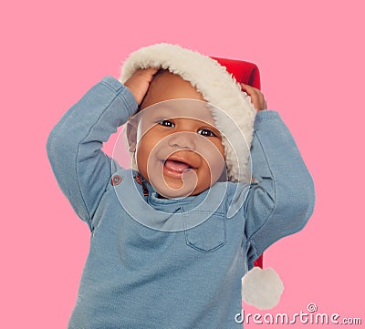 Funny african baby with Christmas cap Stock Photo