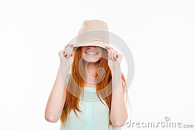 Funny amusing young woman hiding under boonie hat Stock Photo