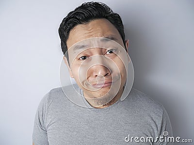 Funny Asian Man Smiling Stock Photo