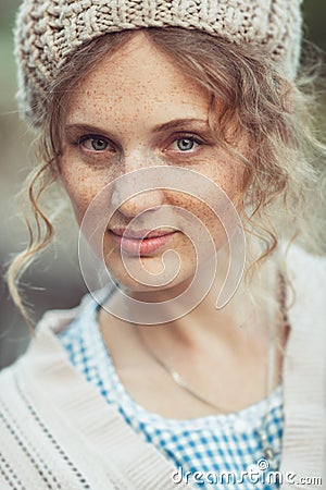 Funny attractive girl with freckles and curly hair Stock Photo