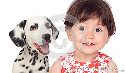 Funny baby with a beautiful dalmatian dog isolated on a white ba Stock Photo