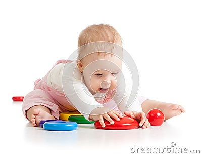 Funny baby playing with toys isolated ober white background Stock Photo
