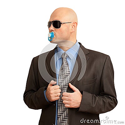 Funny bald man in suit with soother Stock Photo