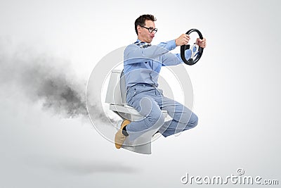 Funny businessman flying on the toilet Stock Photo