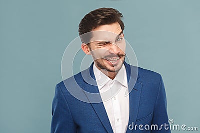 Funny businessman wink and flirt at camera Stock Photo