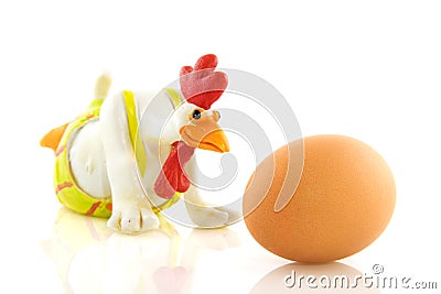 Funny chicken with egg Stock Photo