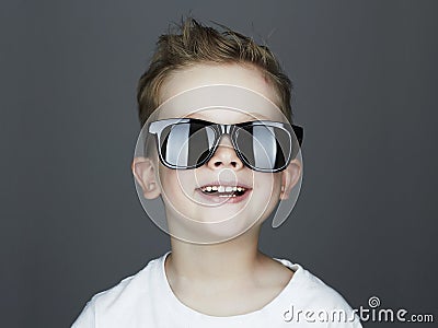 Funny child.fashionable little boy in sunglasses Stock Photo