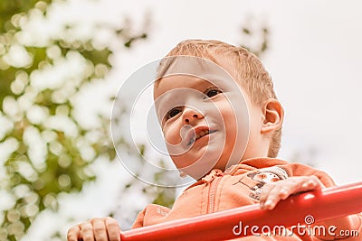 Funny child on playground Stock Photo