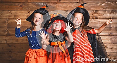 Funny children sister twins girl in witch costume in halloween Stock Photo