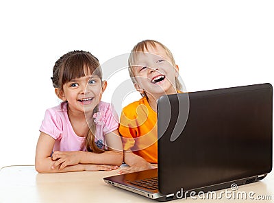 Funny children using a laptop Stock Photo