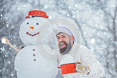 Funny Christmas chef cook. Christmas cookery. Handsome Santa Claus cook. Stock Photo