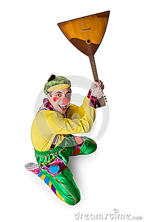 Funny clown with a balalaika Stock Photo
