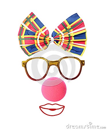Funny clown`s face made of bow, eyeglasses and foam nose on white background Stock Photo