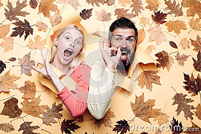 Funny couple are getting ready for autumn sale. Funny fac . Happy family in Autumn. Stock Photo