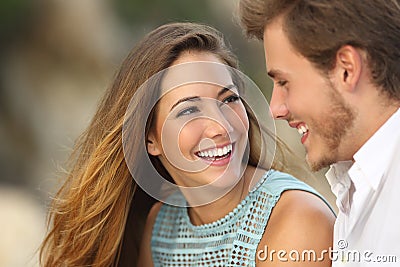 Funny couple laughing with a white perfect smile Stock Photo