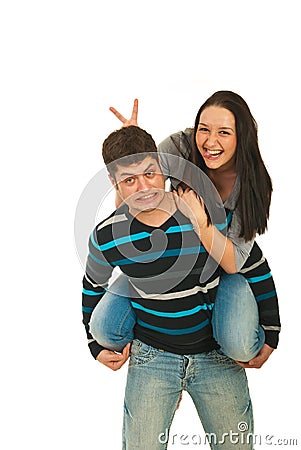 Funny couple in piggy back Stock Photo