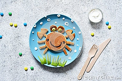 Funny crab on a plate. Pancake crab, children`s breakfast. Lunch to school Stock Photo