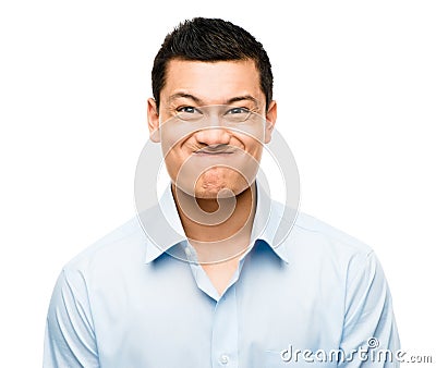 Funny crazy face man mixed race latino Stock Photo