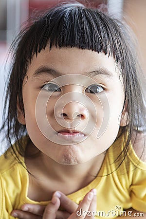 Funny face of asian lovely children Stock Photo