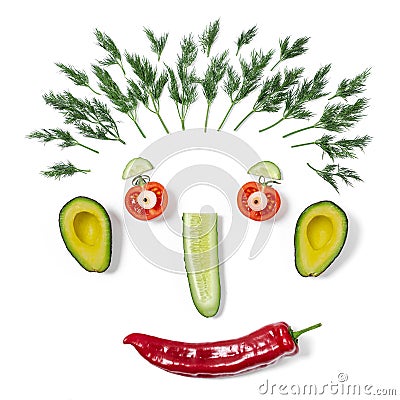 Funny face made of different vegetables Stock Photo