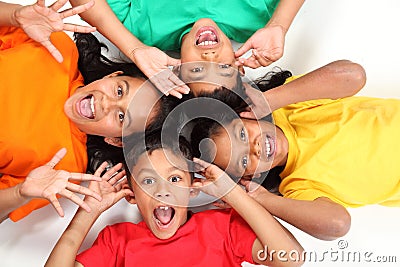 Funny faces by four happy school friends together Stock Photo