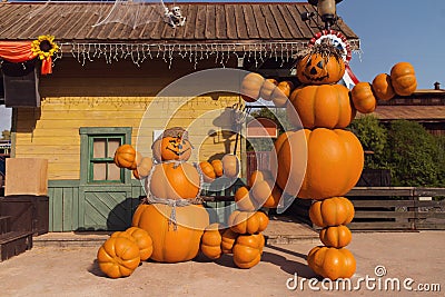 Funny figures made of pumpkins. Halloween street decoration. Happy halloween concept Stock Photo