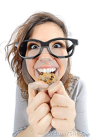 Funny geek girl eating a cookie Stock Photo