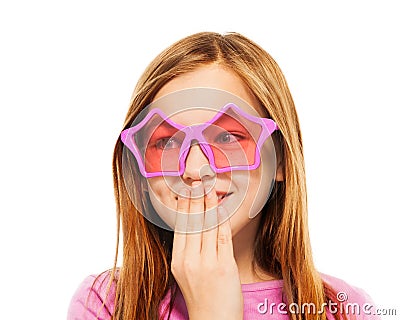 Funny giggling girl in glasses with star frames Stock Photo
