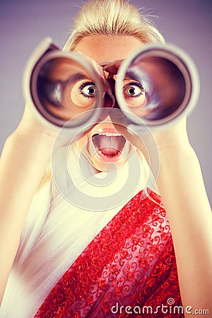 Funny girl portrait with telescope Stock Photo