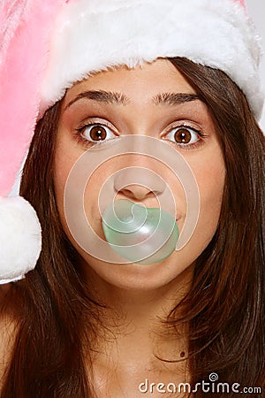 Funny girl in Santa hat Stock Photo