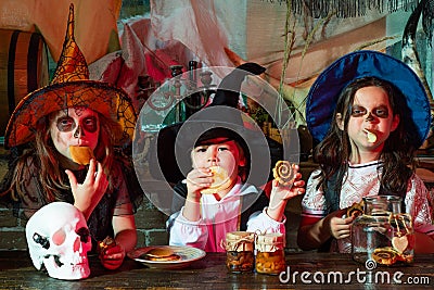 Funny group of friends kids in a Halloween costume on Halloween party. Halloween kids holidays concept. Funny kids in Stock Photo