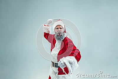 Funny guy in christmas hat. New Year Holiday. Christmas, x-mas, winter, gifts concept. Stock Photo