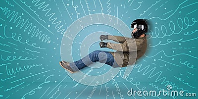 Funny guy drives an imaginary vehicle with drawn lines around hi Stock Photo