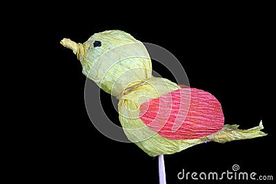 Funny handmade Easter bird are made of yellow paper isolated black Stock Photo