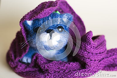 Funny handmade felt cat. Stock Photo