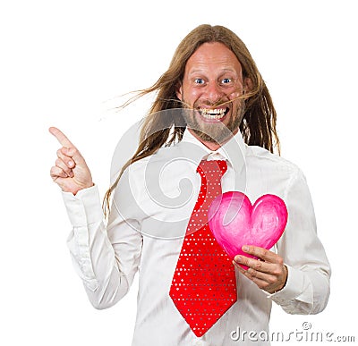 Funny hippie man holding a love heart and pointing Stock Photo