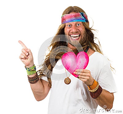 Funny hippie man holding a love heart and pointing Stock Photo