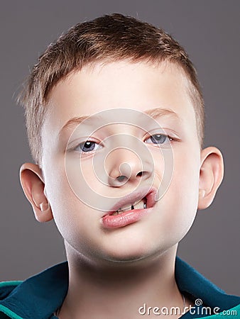 Funny kid. funny grimace emotion child Stock Photo