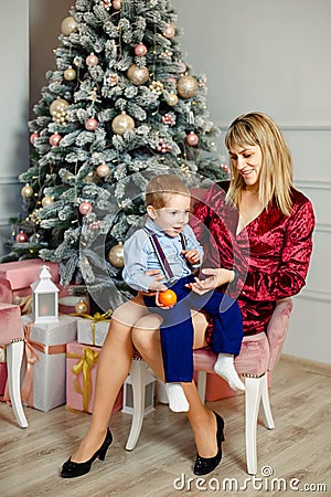 Funny kids enjoy the holiday. The morning before Xmas. Loving family Stock Photo