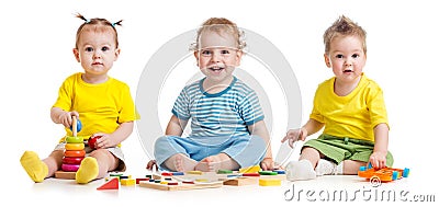 Funny kids group playing colorful toys isolated on white Stock Photo