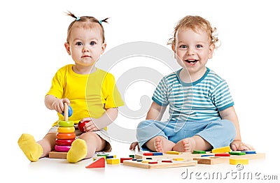 Funny kids playing educational toys isolated Stock Photo