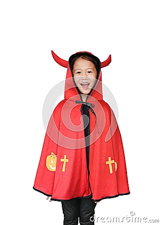 Funny little Asian child girl dressed Halloween costume. Kid in Dracula robe isolated on white background Stock Photo