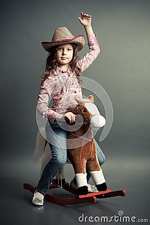 Funny little cowgirl Stock Photo