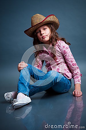 Funny little cowgirl Stock Photo