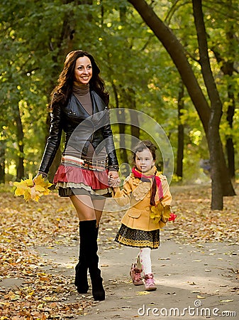 Funny little girl and mother Stock Photo