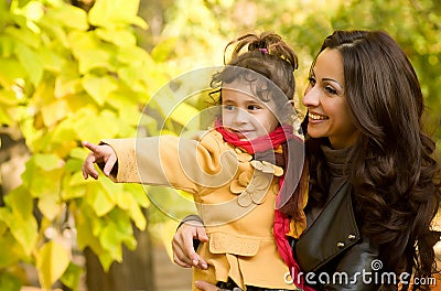 Funny little girl and mother Stock Photo