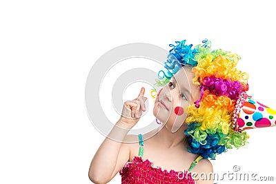 Funny little girl in multicolored wig Stock Photo