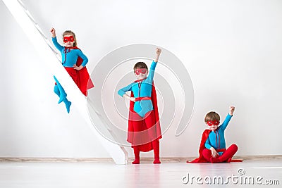 Funny little Kids power super hero. Stock Photo