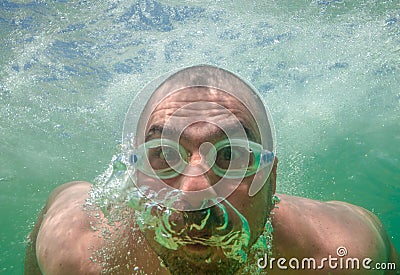 Funny Male Face Underwater Goggles Stock Photo