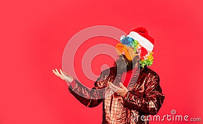 Funny man with beard. Winter holidays. Disco music. Warmest greetings this season. Bearded man celebrate christmas Stock Photo